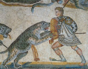 Mosaik med en scene af en jagt på et vildt dyr, detalje af en gladiator, der dræber et vildt dyr af Roman Roman