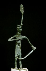 Nuragisk kultur (nuraghi) Sardinsk: bronzebueskyttestatuette. 8.-7. århundrede f.Kr. Cagliari, Nationalt Arkæologisk Museum, Sardinien, Italien