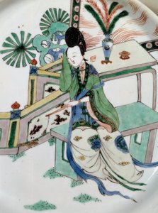 Kinesisk kunst: damen sidder tilbage på en bænk. Maleri på porcelæn fra 1700-tallet. Paris, Guimet-museet, Nationalmuseet for asiatisk kunst af School Chinese