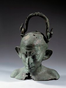 Hovedformet vase i bronze: buste af syrisk slave (?). 2. eller 3. århundrede efter JC. Søn 0,19 m Paris, Musée du Louvre