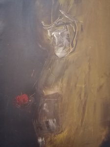 Kontemplativ figur med rødt æble af Stefano Mazzolini