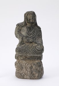 Lille statue af en buddhistisk præst