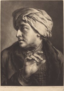 En mand med turban og stribet skjorte