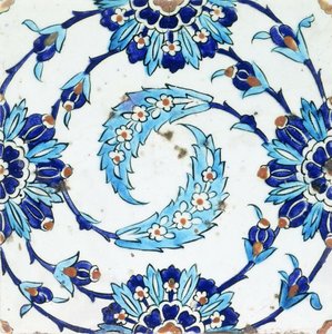 En Iznik keramikflise med et spiralformet blomstermotiv, tidligt i det 17. århundrede (keramik) af Turkish School