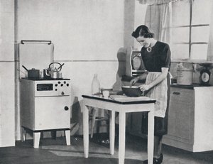 Et britisk køkken udstyret med et skabsgaskomfur, 1942. af Unbekannt