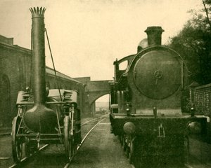 En model af Stephensons Rocket i fuld størrelse sammen med en motor fra George the Fifth Class, Londo af Unbekannt