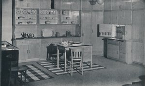 Et køkken arrangeret og udstyret af Heal & Son, Ltd. i London, 1942 af Unbekannt