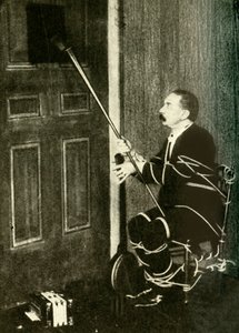 John Nevil Maskelyne udfører en åndekabinet-illusion, c1910. af Unbekannt