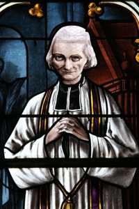 Mezilles kirke. Glasmosaik vindue. Saint John Mary Vianney. Cure of Ars. Frankrig - Abbe Jean Marie Vianney (Vianey, Viannay, Wien), kendt som Cure d