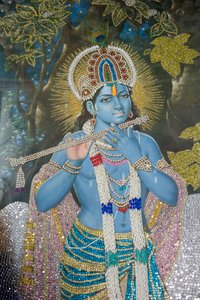 hinduisme; maleri af Lord Krishna med fløjte; Durgiana Mandir Vishnu-templet; Amritsar; Punjab; Indien; Syd Asien; Asien af Unbekannt