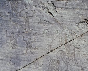 Italien, Lombardiet Region, Valcamonica, Nærbillede af klippetegninger i Naquane National Park af Benjamin Baud