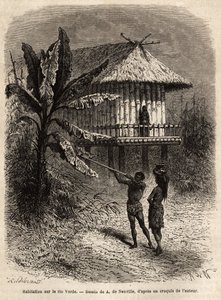 Et par indianere fra Rio Verde (Brasilien) manden med sin sarbacan, foran et typisk hus på pæle. Indgravering til illustration af rejsen til New Granada, af Dr. Saffray, i 1869, udgivet i "" Le tour du monde""" 1873, redigeret af Edouard Charton, e. af Unknown artist