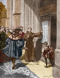 Martin Luther (1483-1546) hænger sine 95 teser i Wittenberg