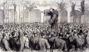 Prædikation af en kapucinermunk til pelerinerne, der kom til Lourdes i de høje Pyrenæer, hvor Jomfruen viste sig for Bernadette Soubirous (1844-1879) i 1858, det nuværende pilgrimssted. Stik fra 1877 af Unknown artist