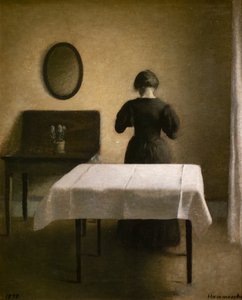 Interiør med en ryg kvinde af Vilhelm Hammershoi