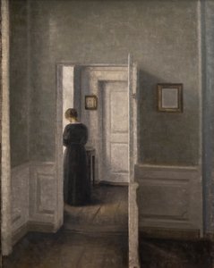 Interiør med en kvinde stående (olie på lærred) af Vilhelm Hammershoi