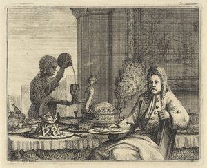 Mand ved et dækket bord