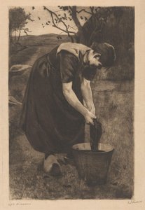 Farmer vasker tekstiler i en spand