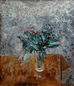 Blomster i et højt glas
