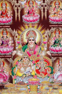 Lakshmi, Vishnus hustru, er gudinde for velstand, held og skønhed. af . .