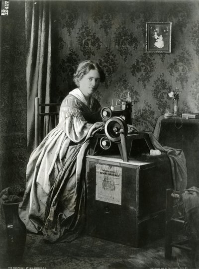 Annonce for Singers patentsymaskiner, 1899 af American Photographer