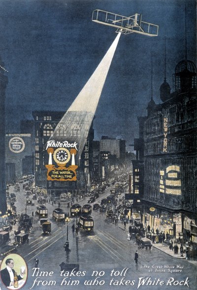 Alkoholreklame "" White Rock"": Et fly, der oplyser "White Rock"-plakaten, der hænger på en bygning på Times Square i New York. 1912. af American School