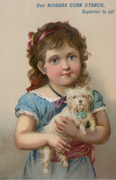 Pige holder lille hund i armene af American School