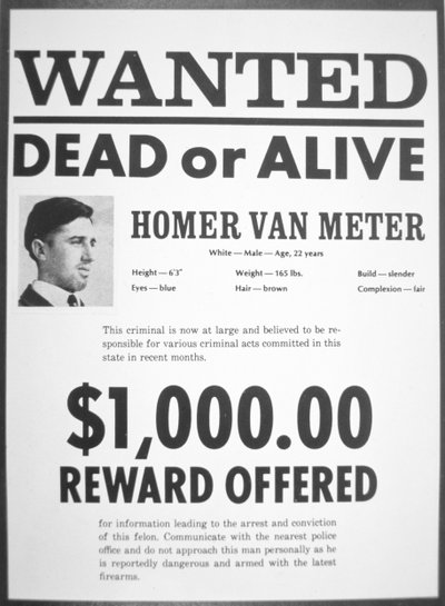 Eftersøgt plakat til Homer van Meter (avis) af American School