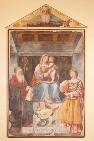 Madonna og barn, St. Anthony Great, St. Barbara og musikerengel af Bernardino Luini