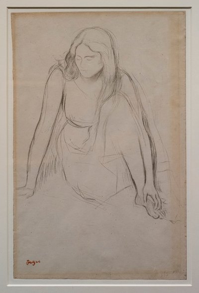 Kvinde sidder ved vandkanten. Omkring 1867-1868. Sort blyant på velinpapir. af Edgar Degas