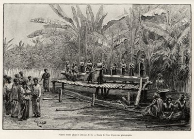 Batak-kvinder, etnisk gruppe i det nordlige Sumatra, banker og renser ris. Gravering af Riou for at illustrere historien "et år i Malaysia" af Jules Claine (1856-1939) af Edouard Riou