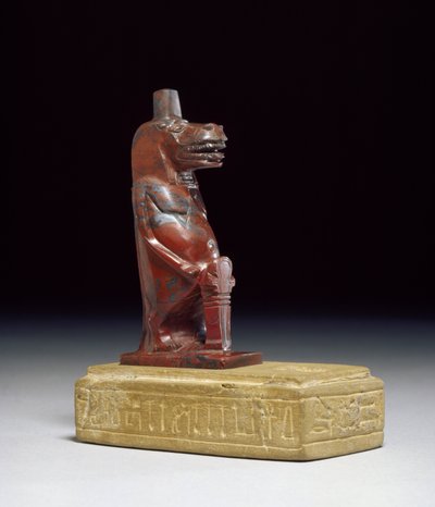 Flodhest-gudinden Taueret, der holder en fletning af rullet papyrus, som danner det beskyttende hieroglyftegn, 