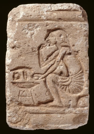 Relief af en mand, der sidder ved siden af et bord, Amarna-perioden (kalksten) af Egyptian