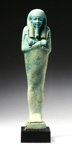 Ushabti-figur for Nakht-Hor-em-heb-mes-em-khereden, sen dynastisk periode, ca. 600 f.Kr. (fajance) (se også 241440) af Egyptian 26th Dynasty