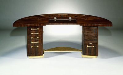Et fint og vigtigt skrivebord, ca. 1929 (af demi-lune design, ebene de Macassar og forgyldt bronze) af Émile Jacques Ruhlmann