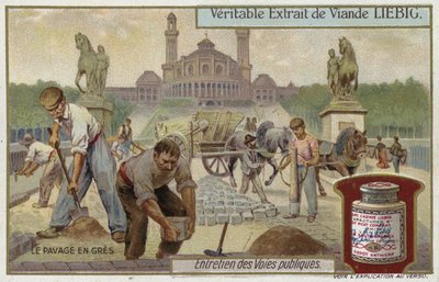 Laying sandstone cobbles  af European School