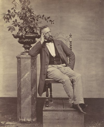 [Mathias Höusermann siddende med albue på piedestal med en vase med blomster], 1850