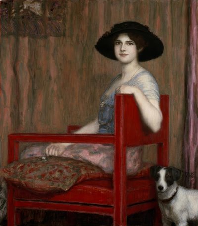 Mary von Stuck i en rød lænestol af Franz von Stuck