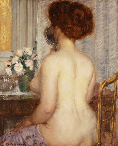 Kvinde ved et toiletbord af Frederick Carl Frieseke