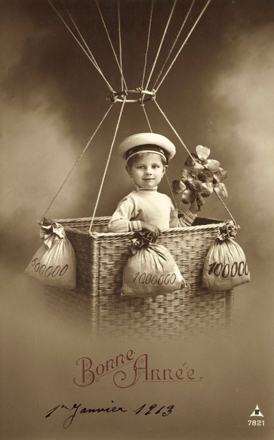 1913 nytårskort, med dreng bestig en ballon, med en masse penge som ballast af French Photographer