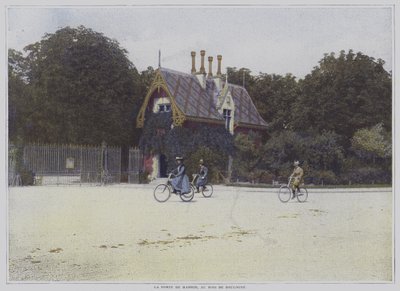 Cyklister, der kører forbi Porte de Madrid i Bois de Boulogne, Paris (farvefoto) af French Photographer
