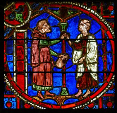 Detalje fra et vindue, der viser scener fra Theophilus