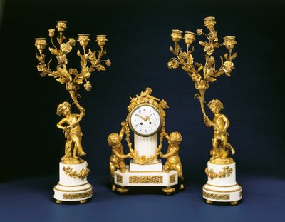 Garniture retailed by Black, Starr and Frost comprising a mantel clock and pair of four-light candelabra, c.1875-1900dani af French School