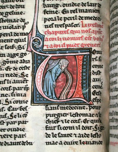 Historik forbogstav, der viser en mand, der kaster op (vellum) af French School