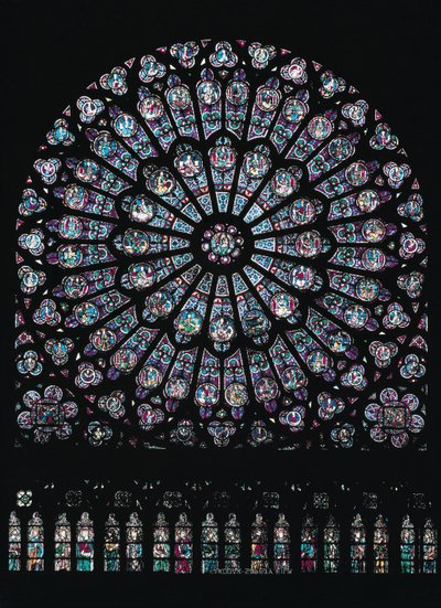 Det nordlige tværarms rosenvindue forestiller jomfruen og barnet i midten omgivet af gammeltestamentlige tegn, ca. 1250 af French School