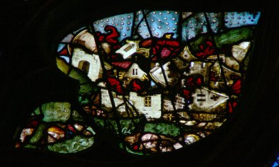 Vinduet med vestrosen viser en scene fra Åbenbaringens Bog: stort jordskælv og hagl så tunge som mønter 16:18-21) af French School