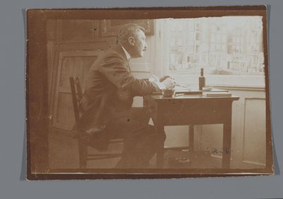 Willem Witsen ved et skrivebord i sin båd af George Hendrik Breitner