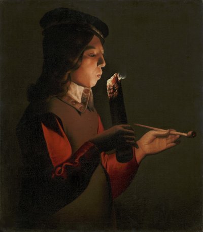En ung dreng med en pibe, der blæser på en ildsjæl, af La Tour, Georges, de (1583-1652). olie på lærred af Georges de La Tour