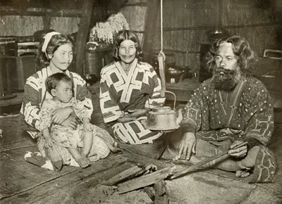Ainu Man and Women at Home, 1910. af Herbert Ponting