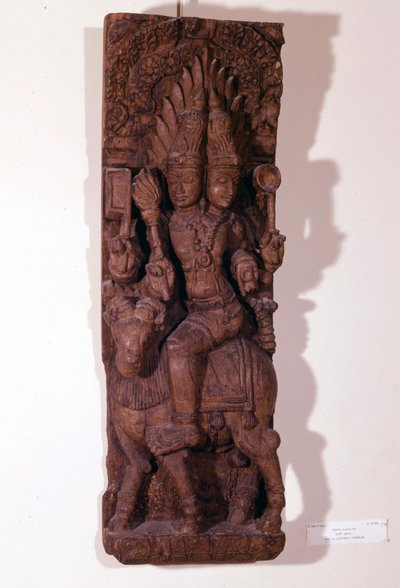 Agni, ildguden, afbildet med to hoveder (bicephal) på en vædder, ifølge hinduistisk mytologi. Træskulptur fra det 17. århundrede. Paris, Musée Guimet. af Indian School